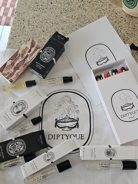 Diptyque Perfume Sample Set with 2 Branded Cinch Bags, Branded Box and Matches.